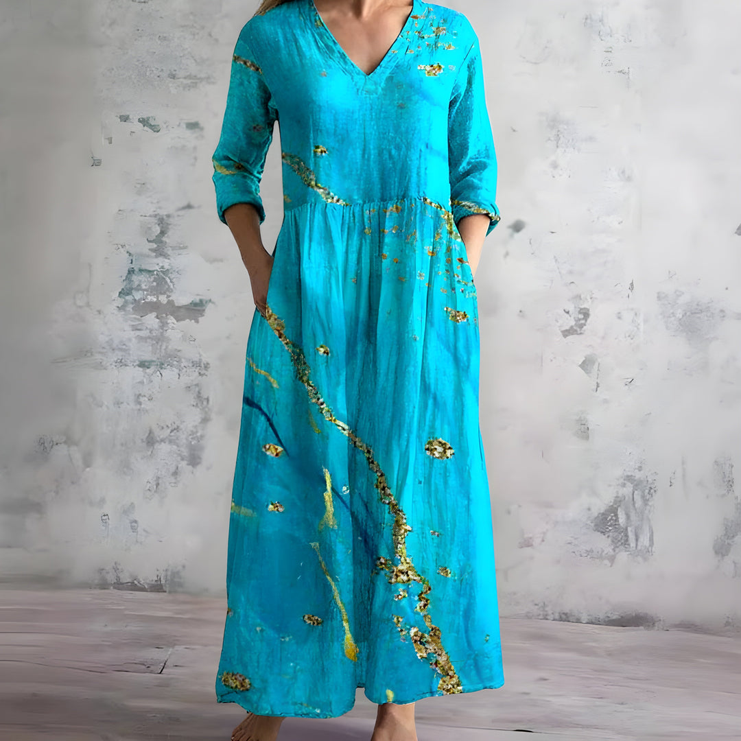 Women's casual flowy V-neck floral maxi dress. Elegant and comfortable for summer vacations & beach.
