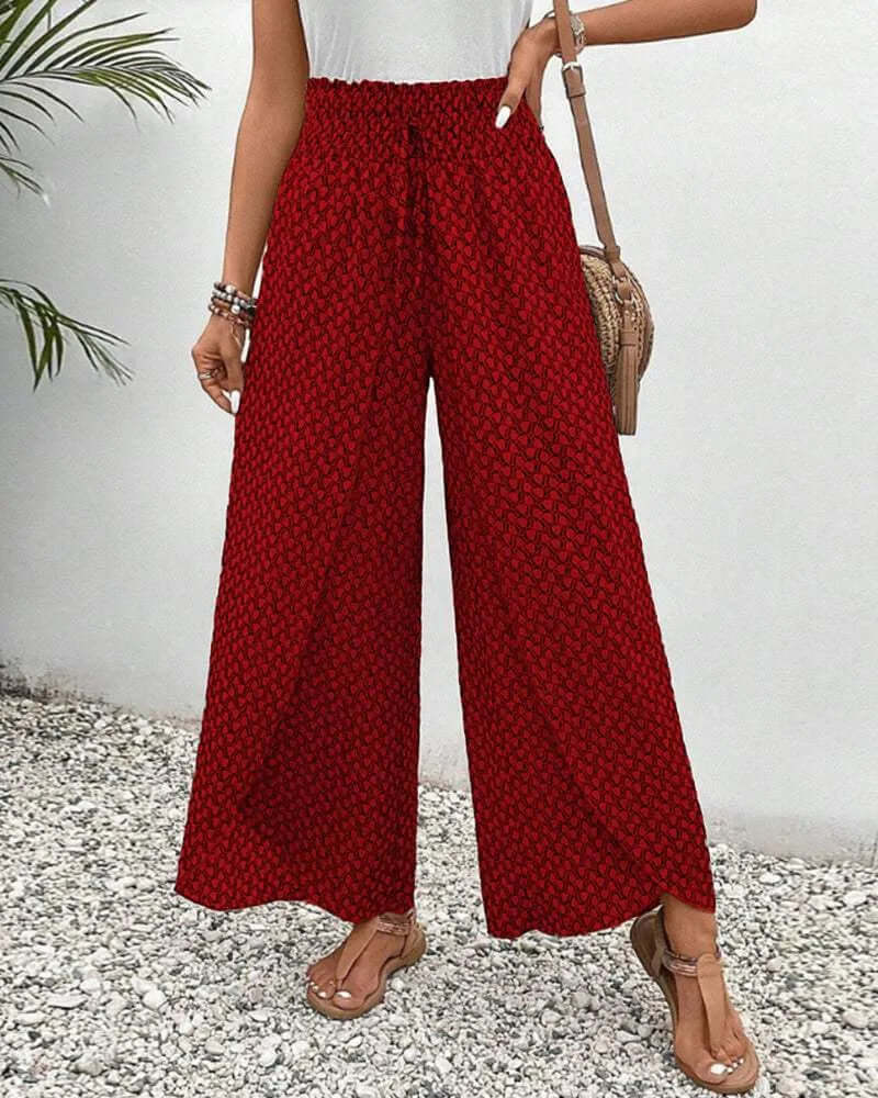 High-waisted women's wide-leg trousers, offering a flattering and comfortable fit.