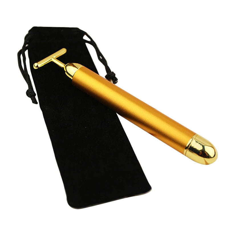 Portable gold vibrating facial roller for women, perfect for daily skincare, facial massage, and promoting self-care.