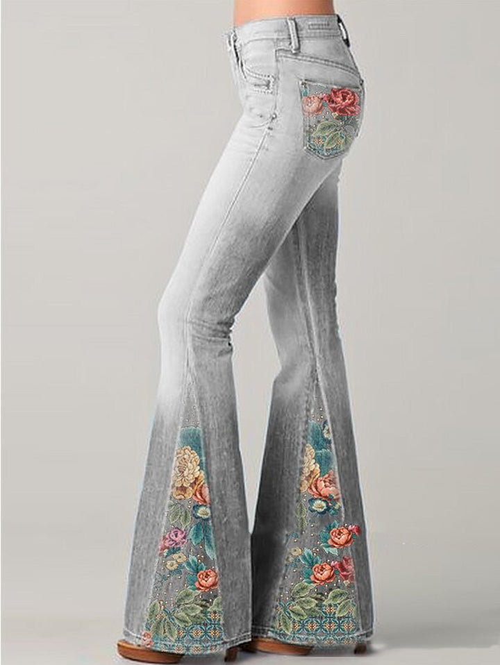 Bohemian high-rise bootcut women's jeans with vibrant floral embroidery. Elevate your everyday casual wear.