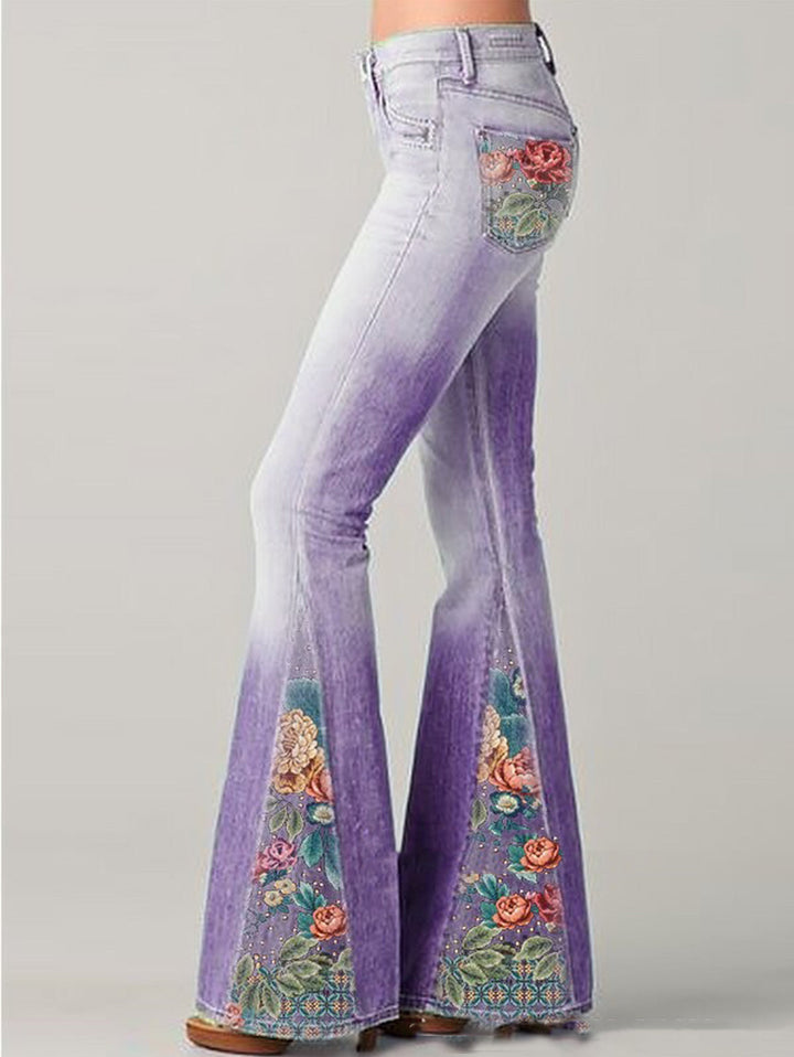 Women's high-rise bootcut denim jeans, embroidered with a stunning floral pattern, offering a unique jean style.