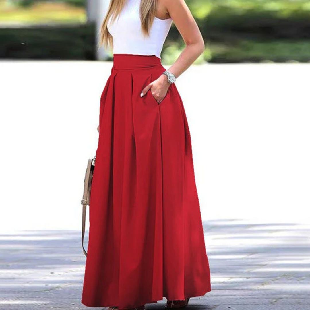 Women's high waist pleated maxi skirt, breathable fabric, elegant summer fashion. Flowy & versatile.