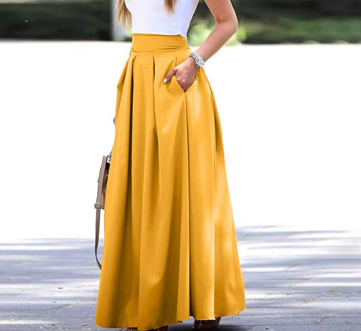 Versatile women's high waist pleated maxi skirt, breathable & elegant. Ideal for summer casual or dressy wear.