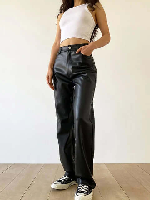 Women's high-waist straight-leg black leather pants, vintage style. Elegant & versatile for fall/winter.