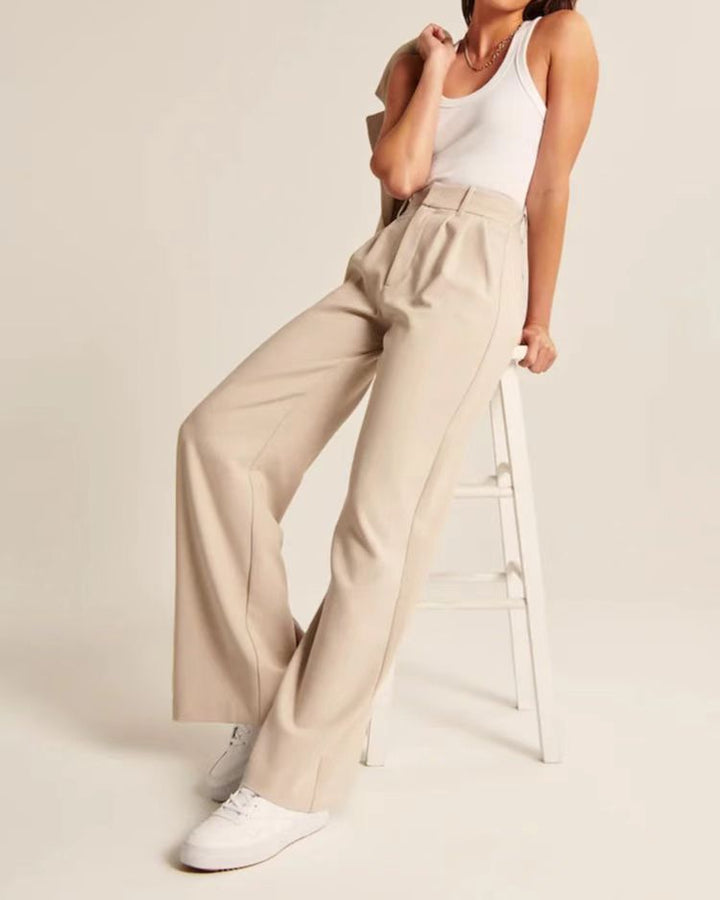 Elegant women's wide-leg pants with a high waist, offering comfortable, tailored style for any occasion.
