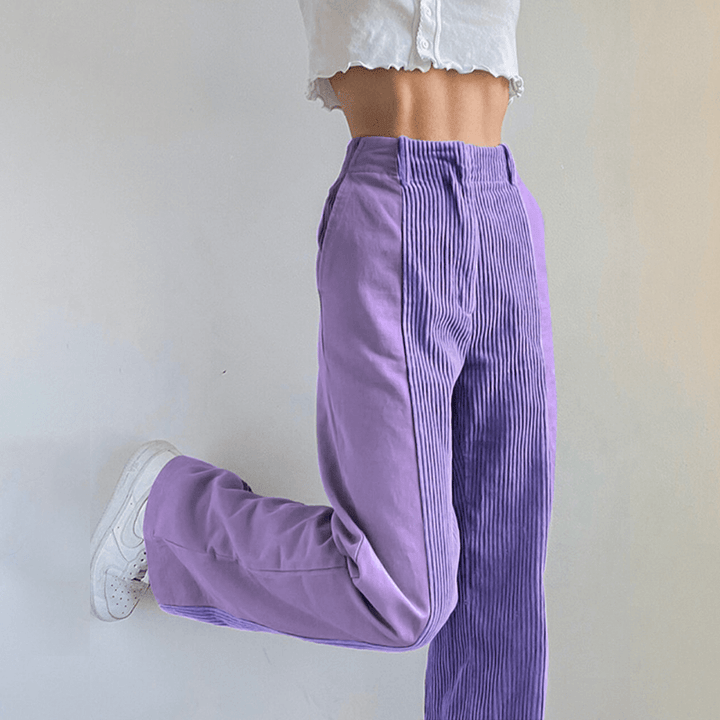 Purple women's high-waisted corduroy wide leg trousers. Fashionable and comfortable pants for fall outfits.