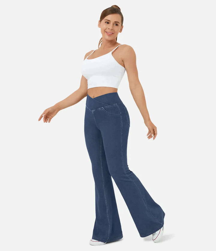 Women's high-waisted flared jeans, elastic waist for ultimate comfort & retro style.