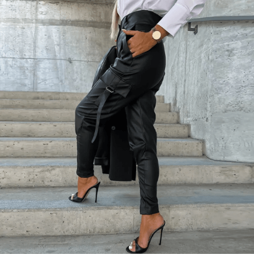 Chic women's high-waisted faux leather pants, smooth PU material, creating a sleek and modern silhouette.