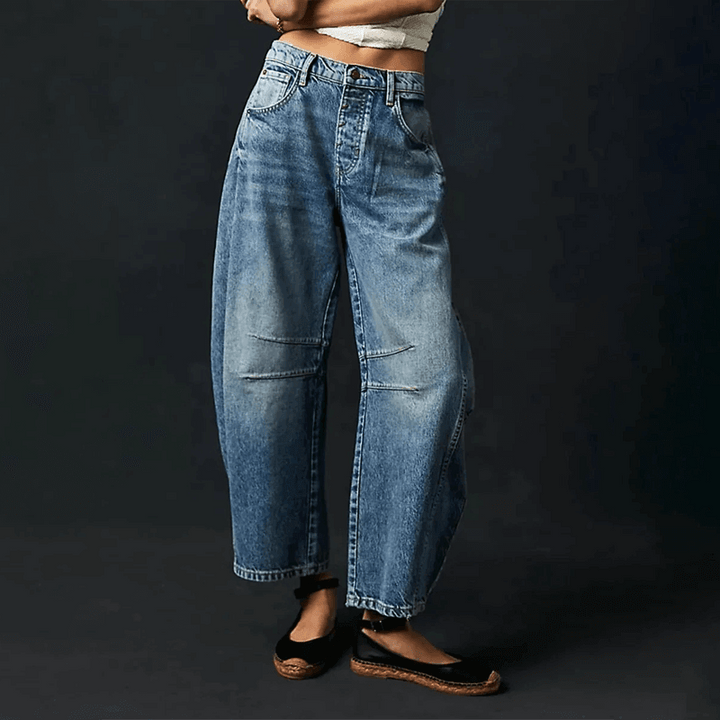 Dark blue women's high-waisted wide leg jeans, stylish denim for a versatile & comfortable modern look.