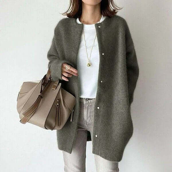 Comfortable women's button-up knitted cardigan, a cozy long-sleeve sweater for everyday layering.