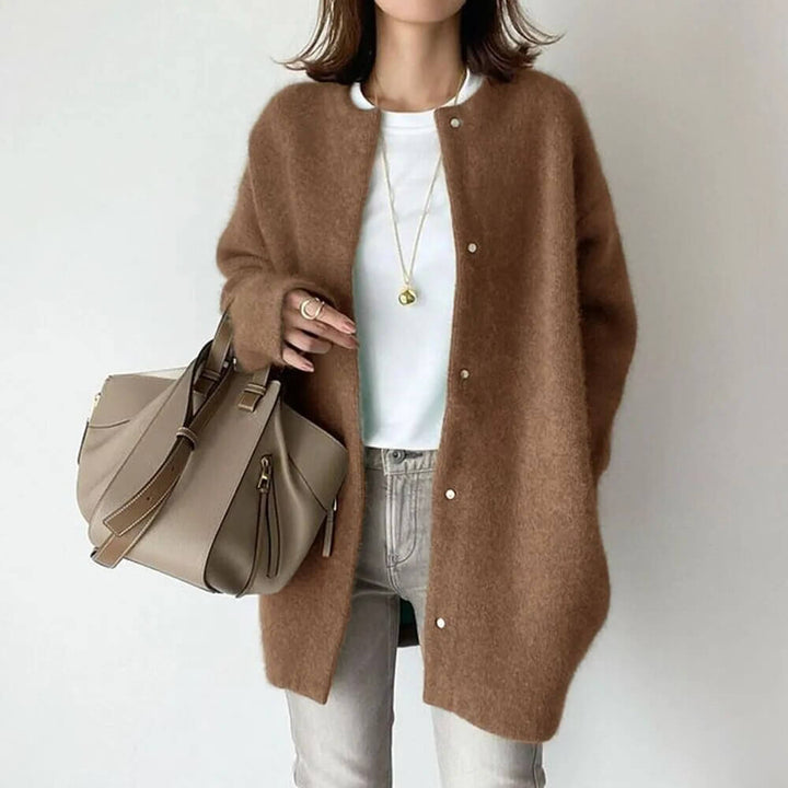 Elegant women's knitted cardigan sweater with buttons, offering warmth & style for fall/winter.