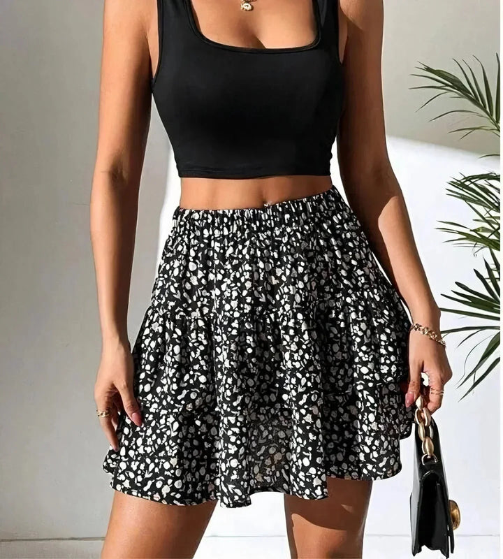 Playful layered A-line mini skirt for women. Flattering, flowy, and ideal for summer vacations.