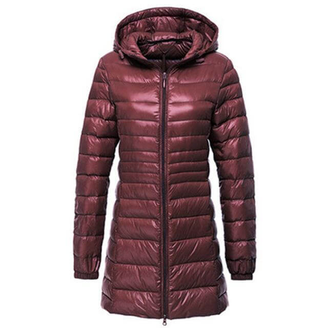 Lightweight women's long down jacket, perfect for fall & winter warmth. Casual, cozy outerwear for cold weather.