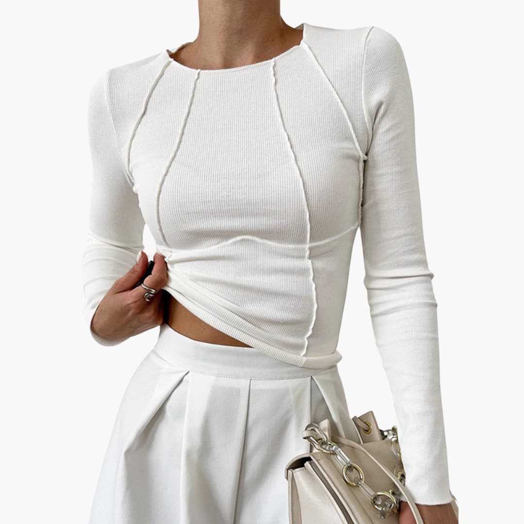 Women's long sleeve top with sculpted seams for a flattering, elegant fit. Polished casual chic style.