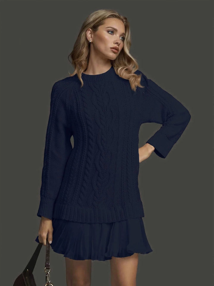 Elegant women's long sleeve winter dress featuring a stylish textured bodice & chic pleated mini hem.