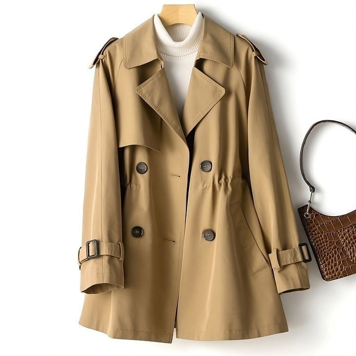 Classic women's long trench coat, a timeless piece for fall and winter fashion. Elegant and versatile outerwear.