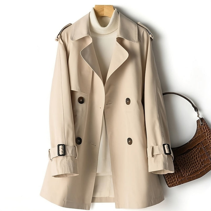 Elegant women's long trench coat, a stylish outerwear choice for fall and autumn, enhancing any look.