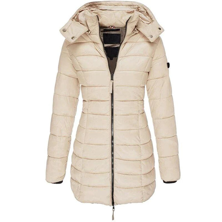 Stylish women's long hooded puffer jacket, perfect for winter. Cozy, warm, and covers more for cold weather.