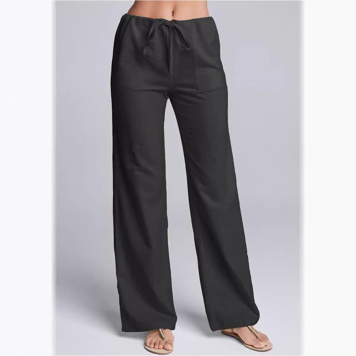 Casual women's cotton linen trousers, loose fit & breathable with a practical drawstring waist for relaxed style.