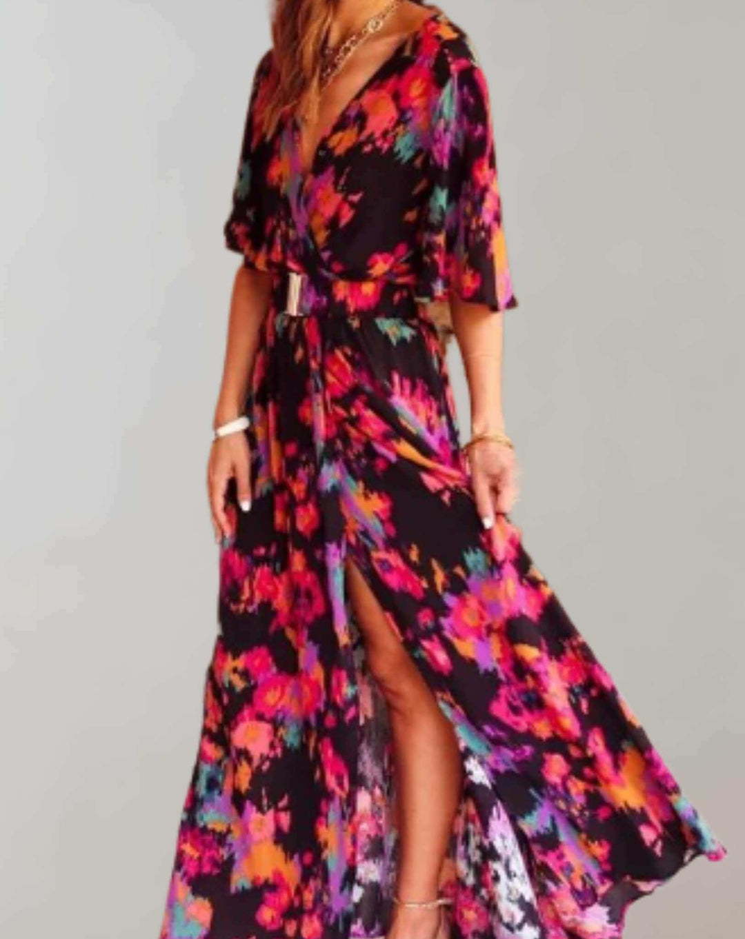 Flowy women's summer floral dress with an elegant slit; comfortable, casual chic, ideal for vacation style.