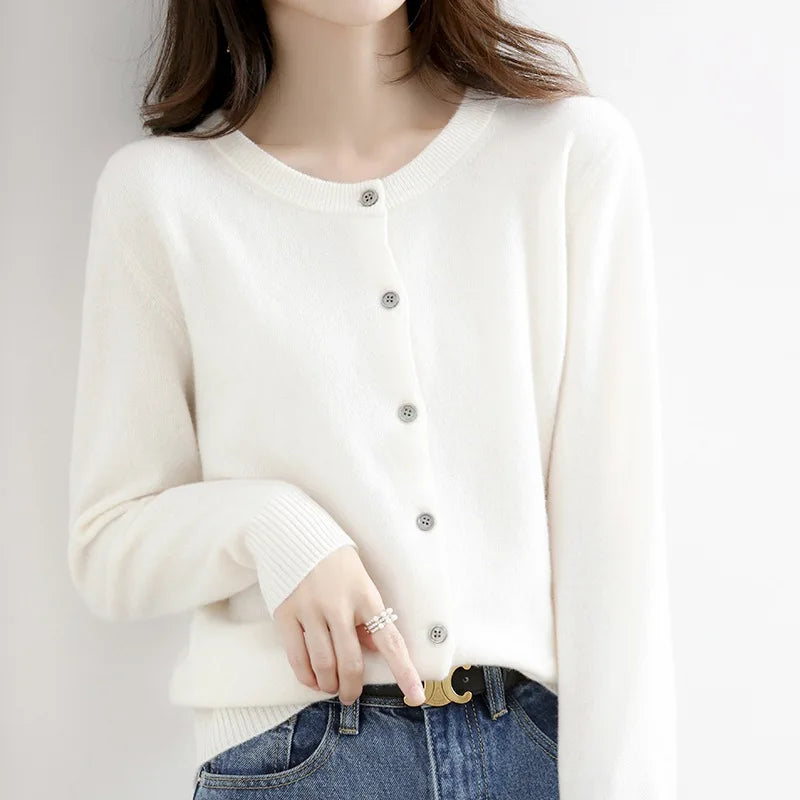 Stylish women's button-up cashmere sweater, offering a cozy and elegant look for any occasion.