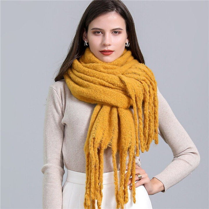 Premium women's checked cashmere scarf, a warm and stylish luxury accessory for cold weather.