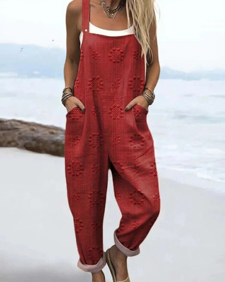 Comfortable women's floral jumpsuit, a chic and elegant one-piece summer outfit suitable for casual wear and warm weather.