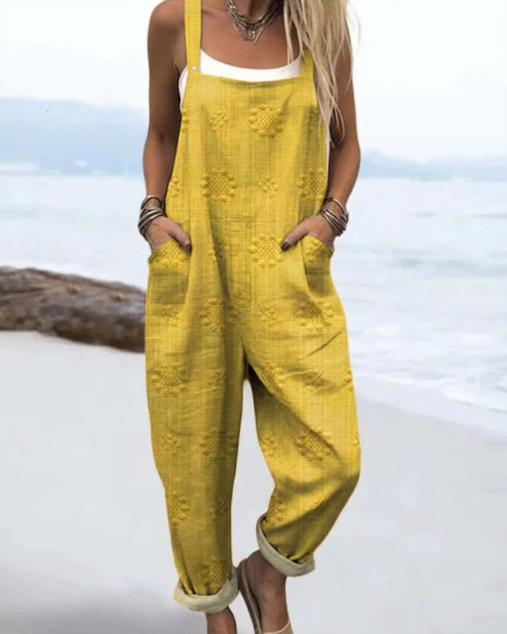Effortless women's Meadow Glow floral jumpsuit, a stylish wide-leg one-piece for chic summer fashion and relaxed comfort.