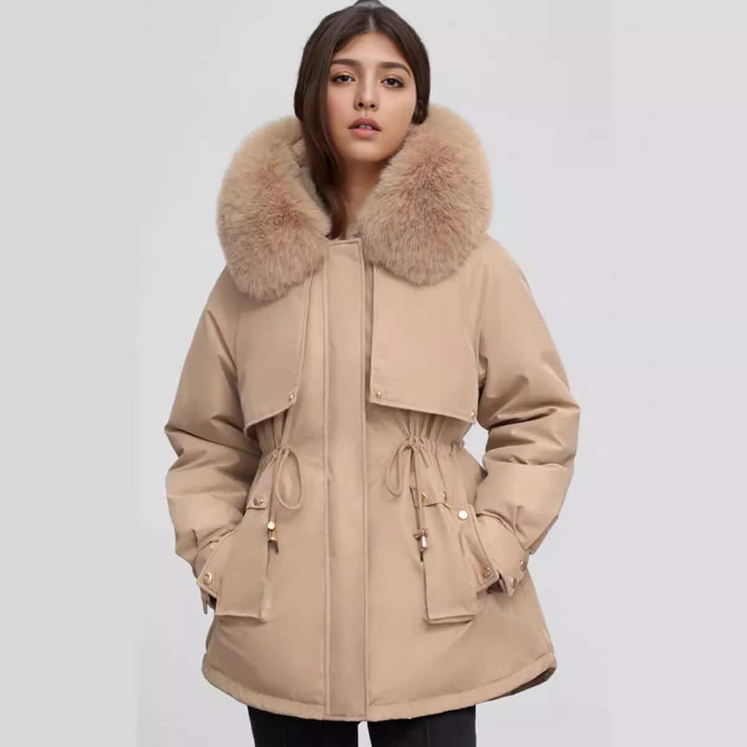 Warm mid-length women's winter coat with a stylish faux fur collar. Perfect cozy outerwear for cold weather.