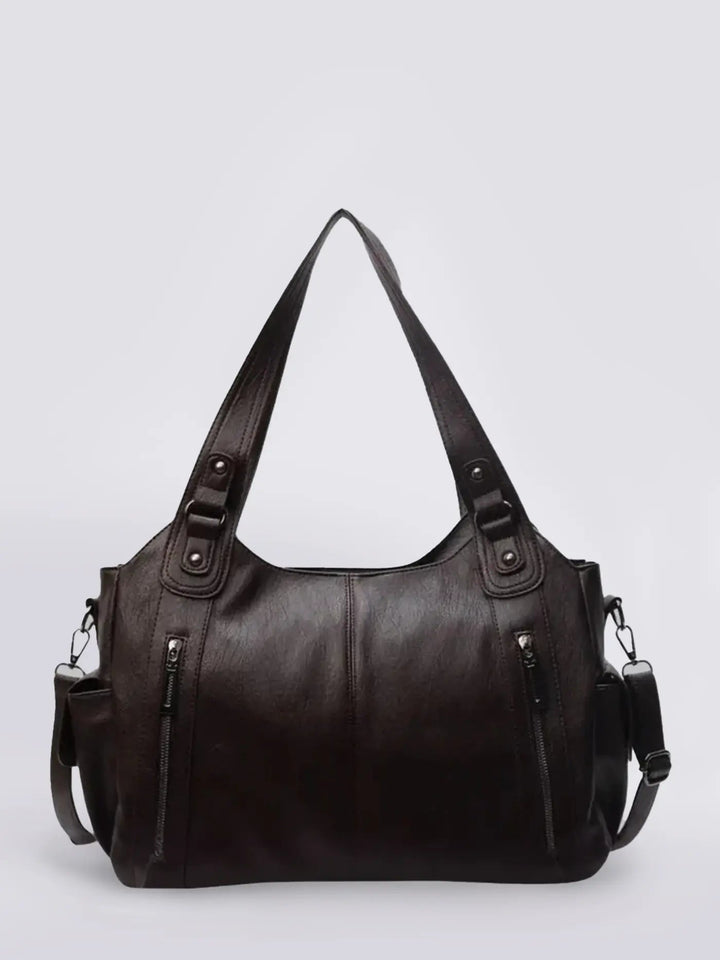 Trendy women's leather multi-pocket shoulder bag with ample space for all necessities.