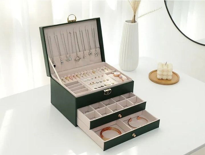 Compact multilayer jewelry box, ideal for women's organized accessory storage & travel.