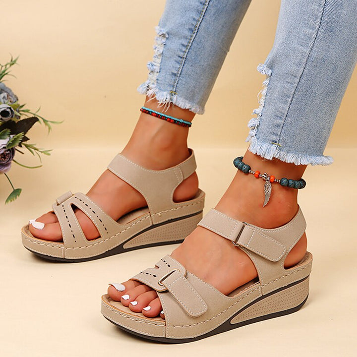 Tan women's orthopedic comfort sandals with adjustable straps, perfect for long-day walking & everyday wear.