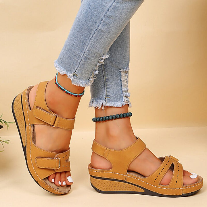 Soft, comfortable orthopedic women's sandals with arch support, ideal for daily wear & ultimate foot comfort.