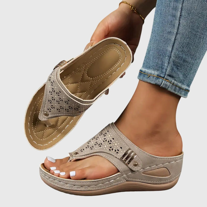 Easy slip-on women's comfort sandals featuring orthopedic arch support for daily wear.