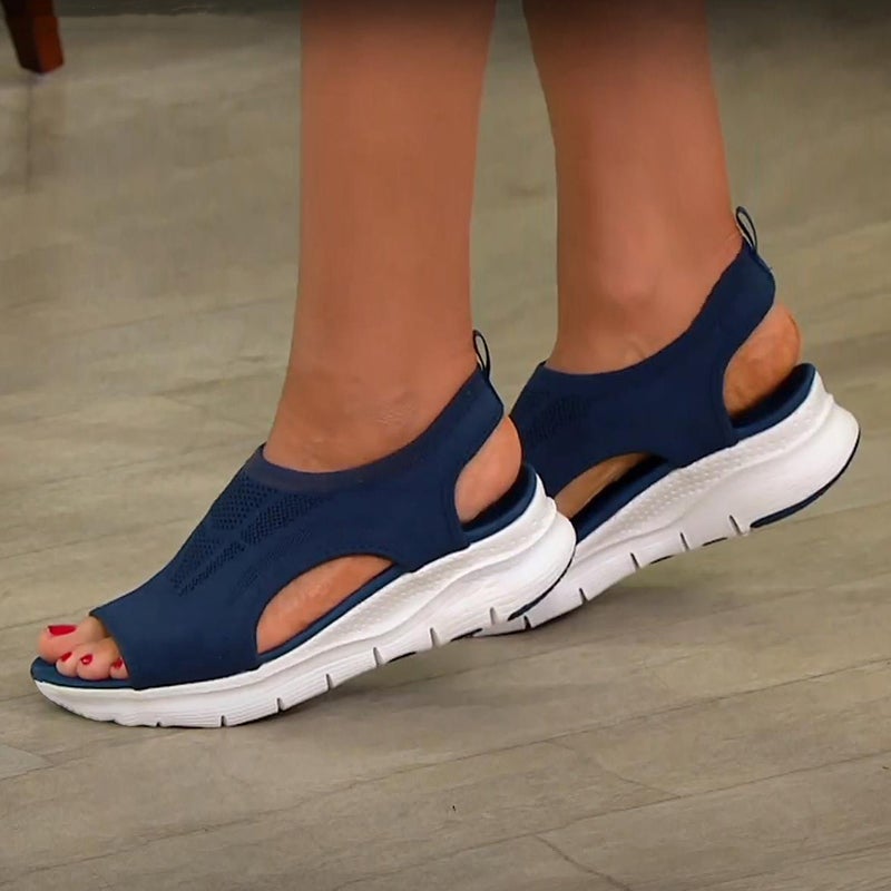Close-up of women's arch support sandal, showcasing soft straps and supportive footbed.
