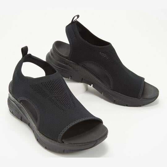 Dynamic shot of women's sport sandals with arch support, reflecting active lifestyle.