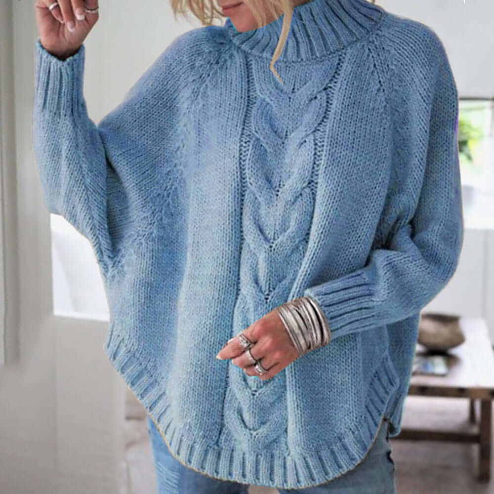Women's oversized batwing sleeve jumper in a cozy knit for stylish, comfortable casual wear. Perfect for fall.