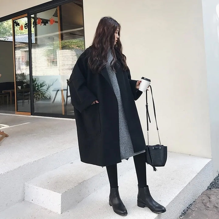 Stylish women's oversized wool blend trench coat, perfect for fall fashion, winter elegance, and spring chic.