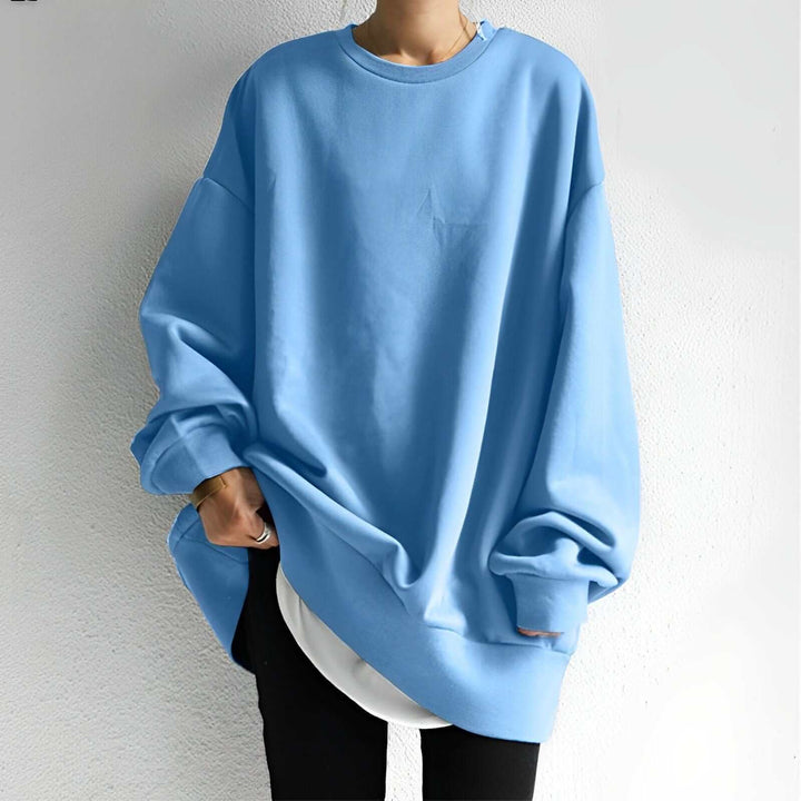 Soft women's oversized cotton pullover sweater, ideal for cozy loungewear and casual outfits.