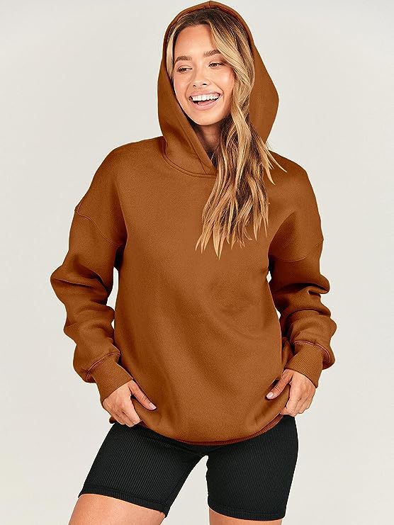 Women's oversized grey pullover hoodie, loose fit, long sleeve for ultimate comfort & casual loungewear style.