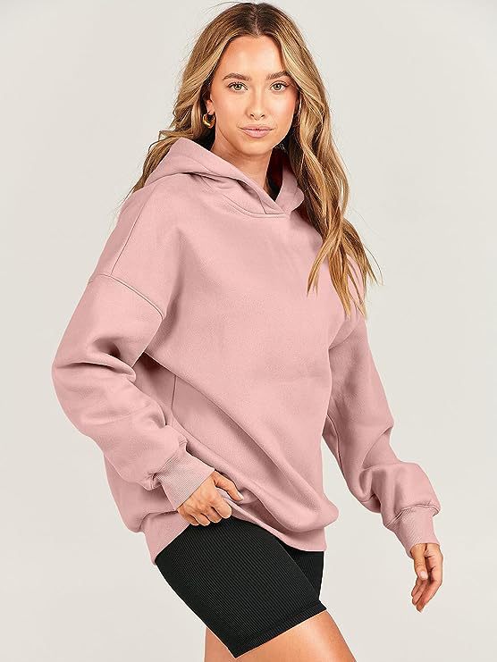 Stylish women's oversized long sleeve hoodie, loose fit pullover, ideal for effortless casual & fall fashion.