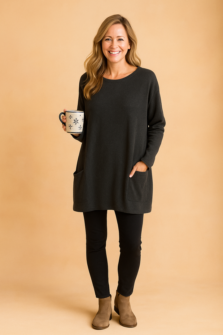 Women's oversized heather gray sweater with front pocket, perfect for casual fall comfort and lounging.