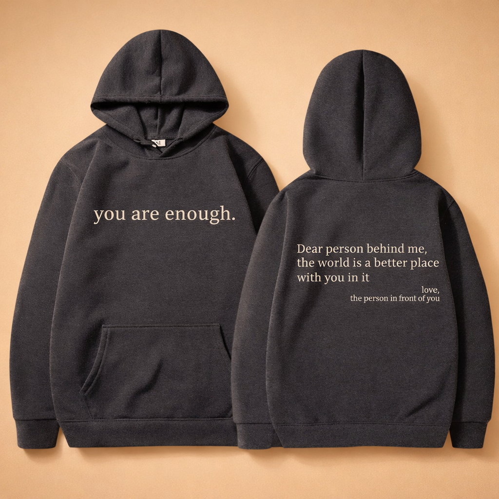 Stylish women's relaxed fit graphic hoodie featuring a positive slogan for everyday loungewear.