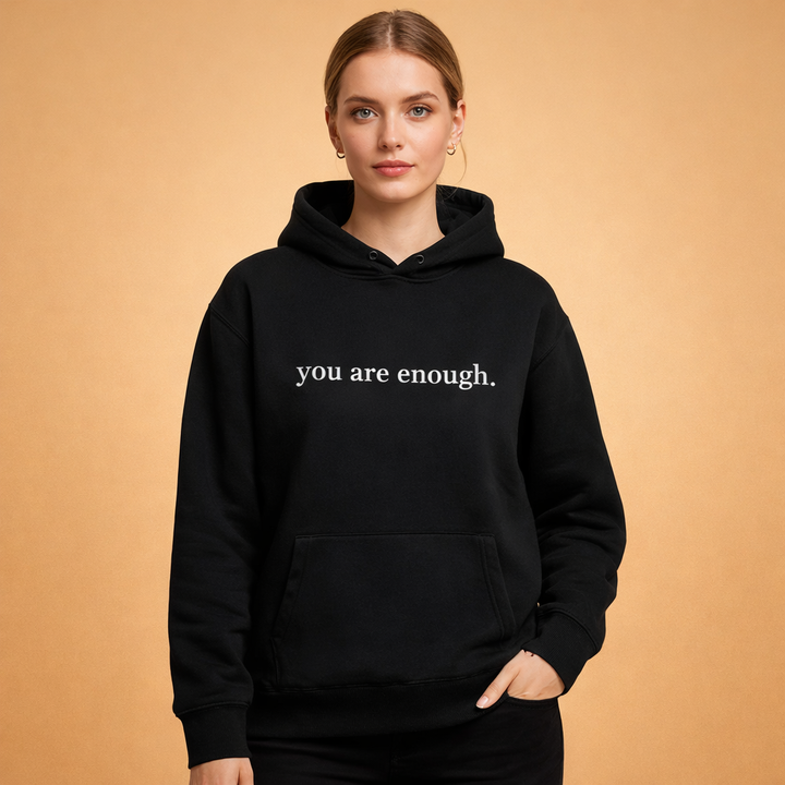 Comfortable oversized women's hoodie, a soft statement piece with an inspirational message.