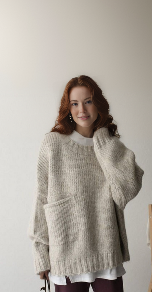 Women's oversized jumper, soft knit texture for a warm and inviting winter look.