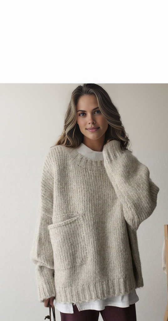 Women's knitted pullover, comfortable and oversized for daily wear and cozy warmth.