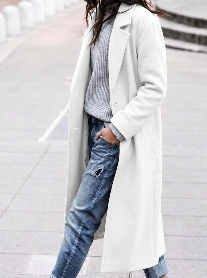 Comfortable oversized long trench coat for women with classic lapel. Stylish outerwear for fall & winter.