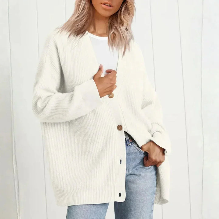 Stylish women's longline oversized cardigan with buttons; a chic & versatile layering piece for any look.