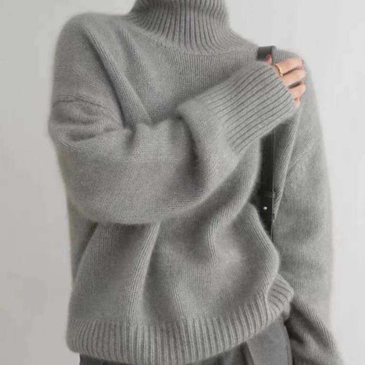 Women's oversized turtleneck sweater, combining cozy comfort, chic style, and winter warmth.