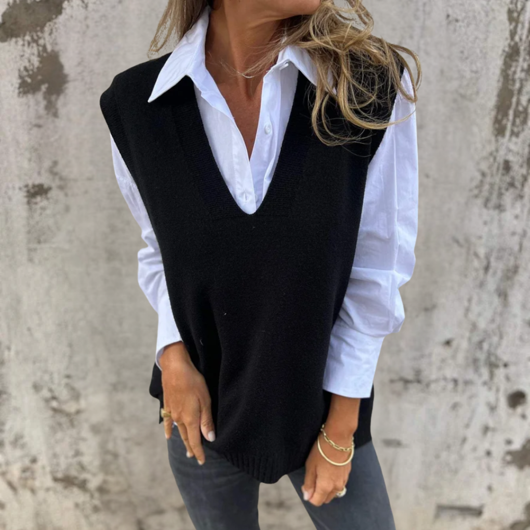 Chic oversized women's V-neck knitted vest, a comfy sleeveless sweater for effortless layering.